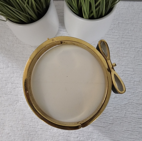 Kate Spade Black and Gold Bow Textured Hinged Bracelet - Picture 6 of 11